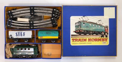 a box with a train set in it on a table