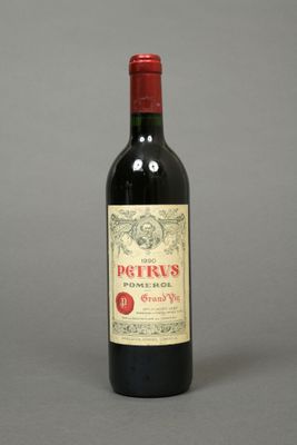 a bottle of wine that is sitting on a table