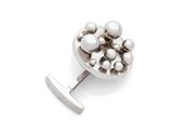 an image of a close up of a pair of cufflinks