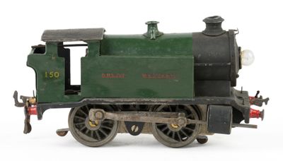 a toy train on a white surface with a white background