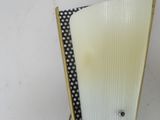 an image of a chair with a black and white polka dot seat