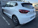 a white car that is parked in a parking lot
