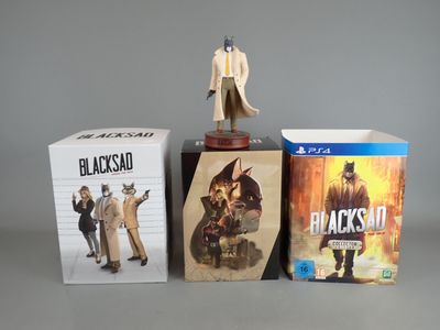 a statue of a man holding a gun next to a box of games