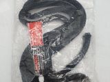 a plastic bag with a black snake inside of it