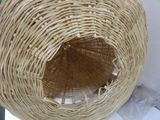 a wicker basket that is sitting on top of a table