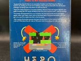 the box for the nintendo hero game is sitting on a table