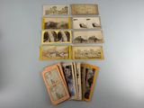 a lot of old postcards on the table