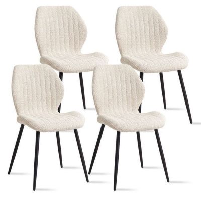 set of four white dining chairs with black legs