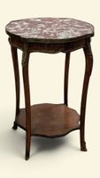 Table de milieu marquetée reposant sur quatre pieds légèreme…