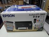 a box with a printer on it sitting on a table