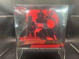 a close up of a display case with a red and black poster on it