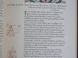an open book with a drawing of a man on it