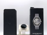a picture of a smart phone and a smart watch on a stand