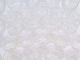 a lot of glasses that are sitting on the table