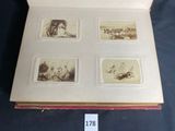 a book with pictures of people and animals on it