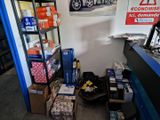 many boxes and boxes on the floor in a room