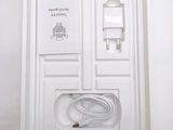 a white tray with a charger and a charger on it