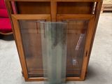 an image of a display cabinet with a glass door