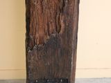 a piece of wood that is sitting on the floor