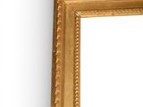 an image of a gold frame on a white wall