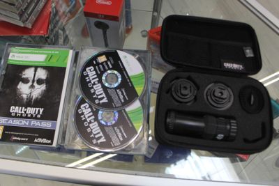 a glass table with a dvd and a case on it