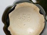 a close up of a vase with a number on it