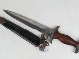 a knife that is laying on top of a table