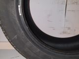 the tire of a car that is sitting on top of the floor