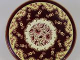 l'image d'une assiette ornée d'un motif floral