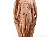 an image of a statue of two women standing next to each other