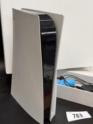 an image of a white computer on a black table