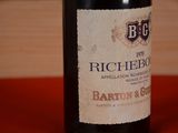 a bottle of wine that is sitting on a table
