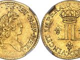a gold coin with a crown on top of it