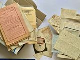 a box full of old papers on a table