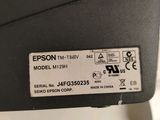 a close up of a label on the back of a printer