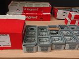 many boxes of different types of batteries on a table