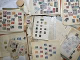 a lot of old stamps on the table together