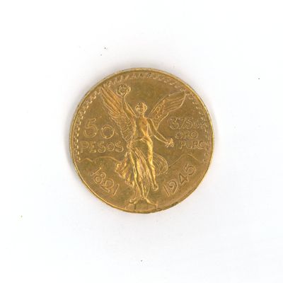 une pièce d'or sur laquelle est représenté un ange, sur un fond blanc