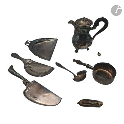 a lot of silver items that are on a white surface
