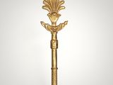 a gold key with an ornate design on it