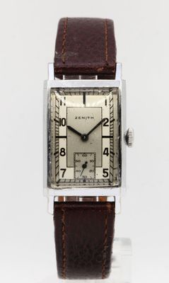 an image of a silver square watch with a brown leather strap
