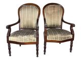 pair of antique chairs with upholstered upholstered back and arms