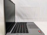 an open laptop computer sitting on top of a white table