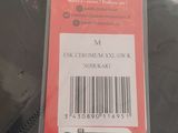 a label on the back of a black jacket