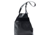a black purse with a strap hanging from it ' s side
