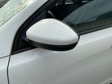 a close up of a car ' s side view mirror