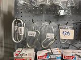 a display of various items on the wall in a store