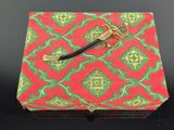 a red box with a green and yellow pattern on it