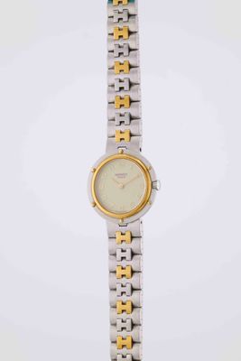 HERMÈS Olympia Vers : 1990. Boîtier : rond acier, fond à cli…