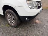a white pick up truck parked in a parking lot